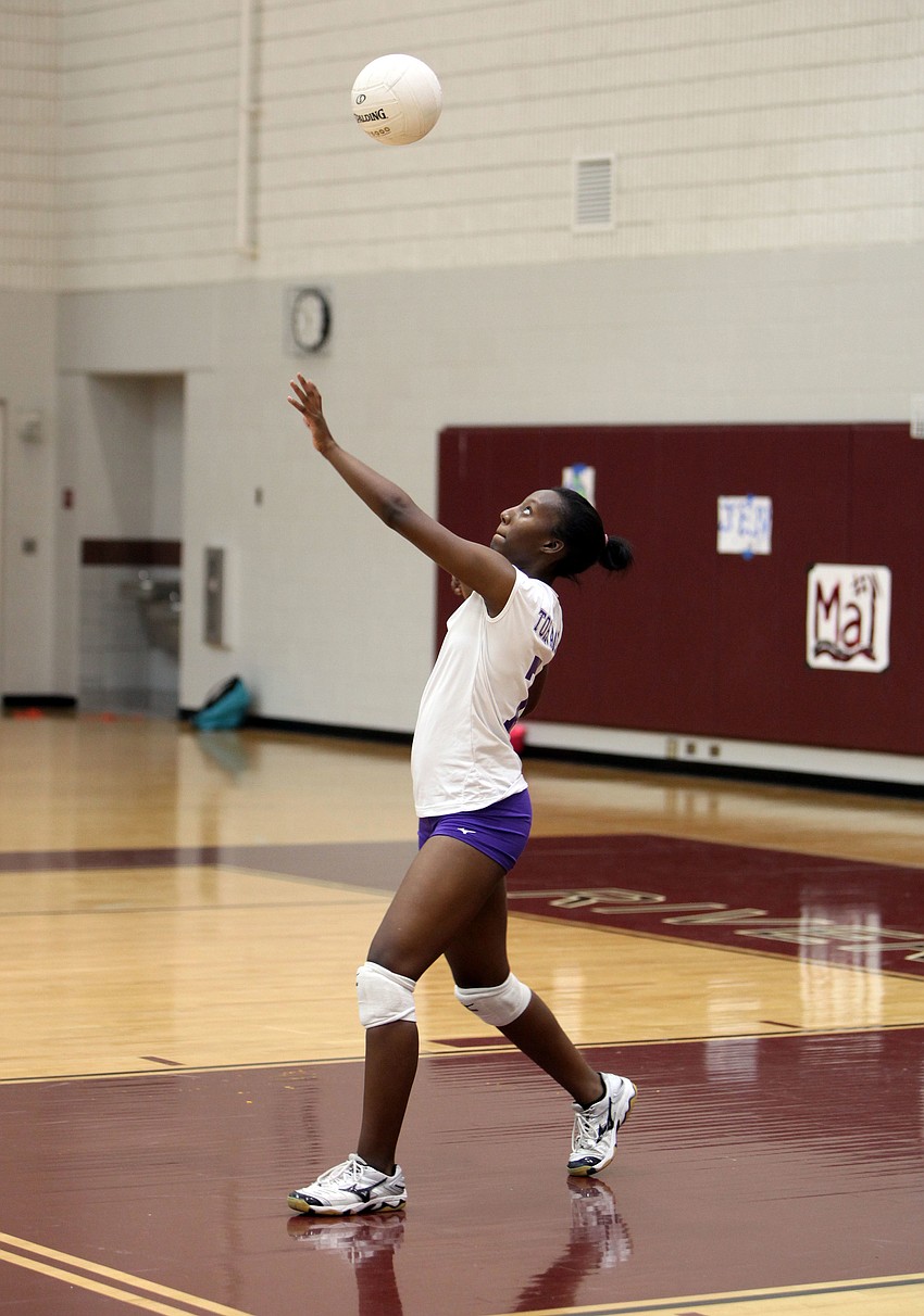 Shakaria Ige, No. 7, prepares to serve.