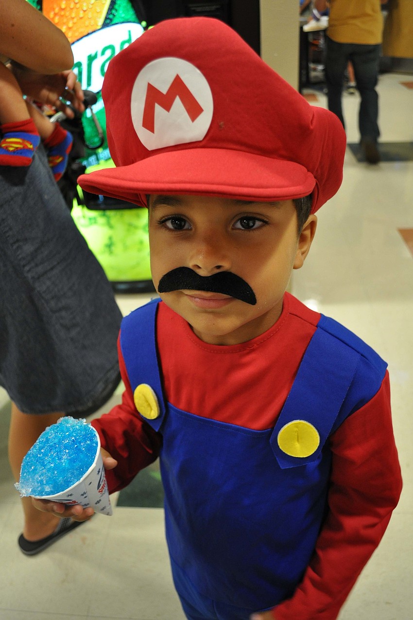 Carter Baker, 4, did not keep his mustache on for long.