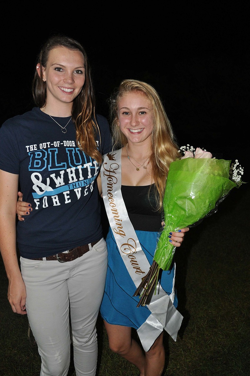 Lisa Hoffman congratulated her friend Rachel Rodgers for being chosen for the Homecoming Court.