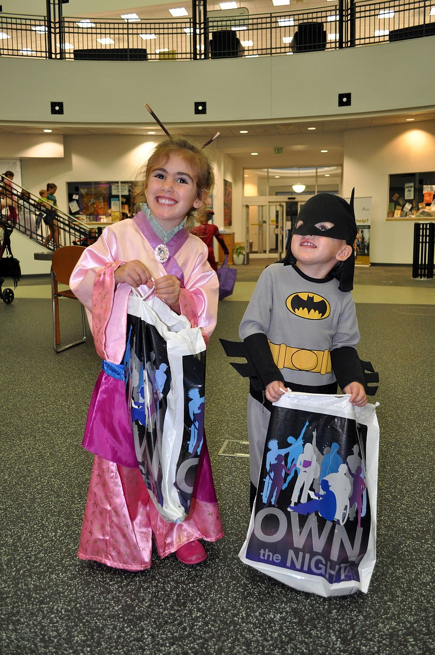 Bronwyn, 3, and Jack, 2, Leggett dressed up as Mulan and Batman.