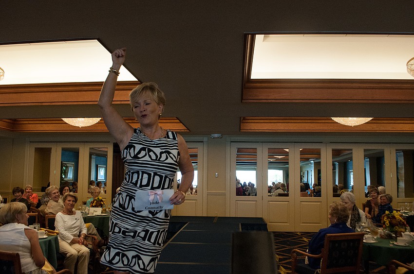 Barbara Gardner shows off a dress from Jude Connally Boutique.