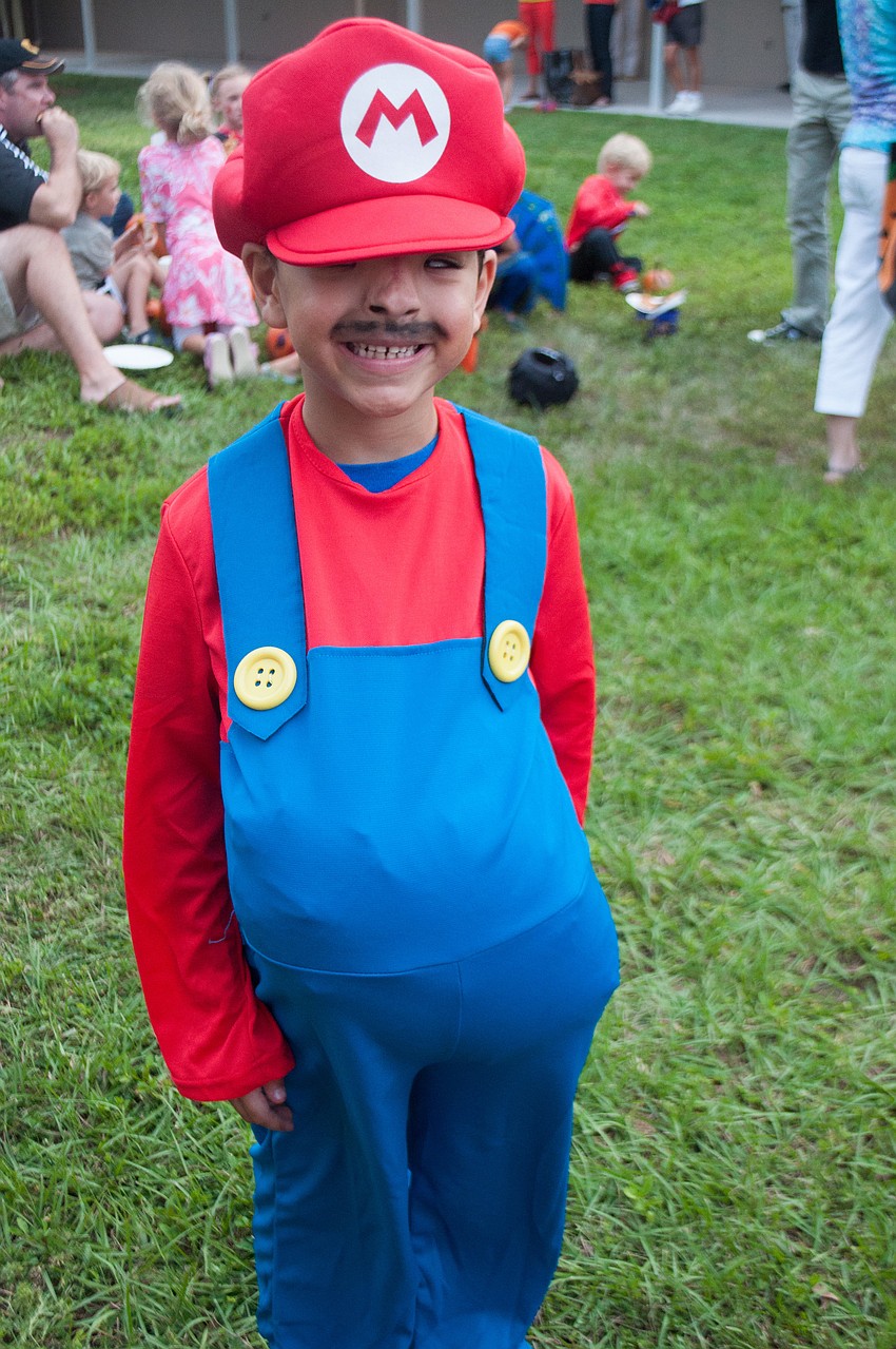 First grader Miguel Rodriguez dressed as Super Mario for the event.