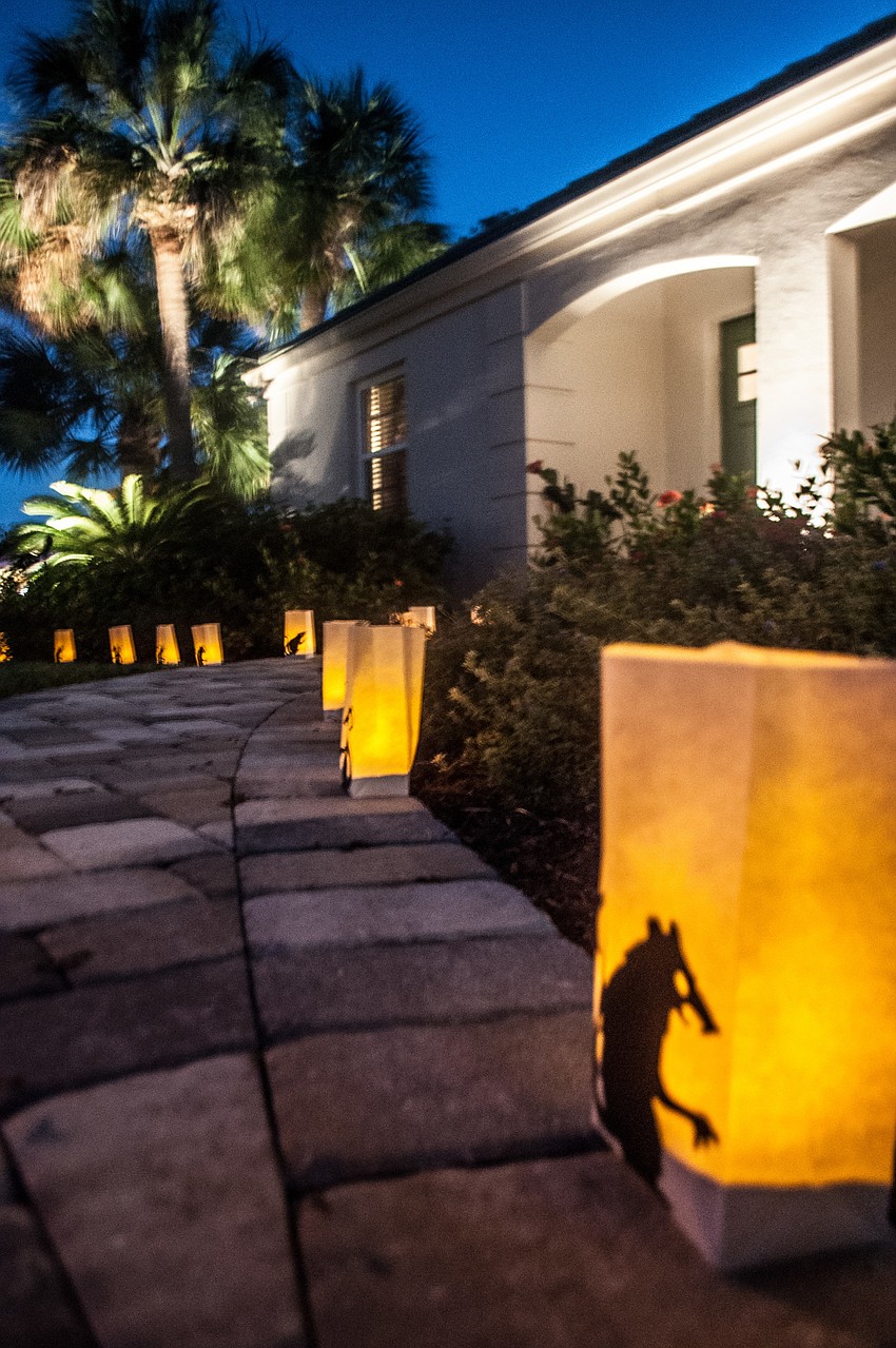 Linda Carrier made these lanterns to decorate the front of the Summerâ€™s home for the party.