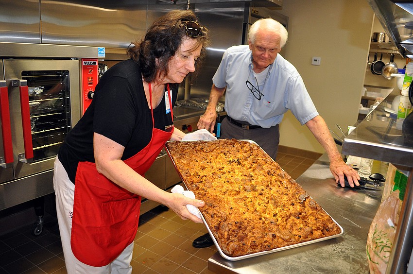 Judy Marsh and Jim Seaton were in charge of cooking up dinner and making desserts Saturday, Nov. 3, at the Welcome Back dinner at Christ Church.