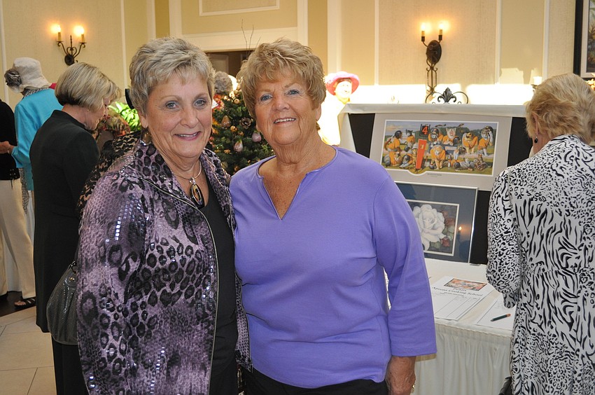 Mary Jo Steltmann wore her favorite color purple with Jan Ganz