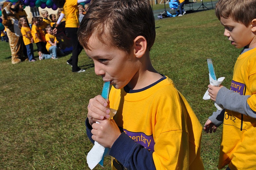 Trevor Schmid enjoyed a frozen treat at the end of his walk.