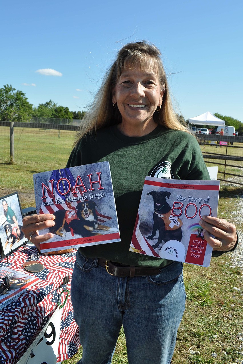 Pat Abrams, of Sarasota K-9 Search & Rescue, sold books.