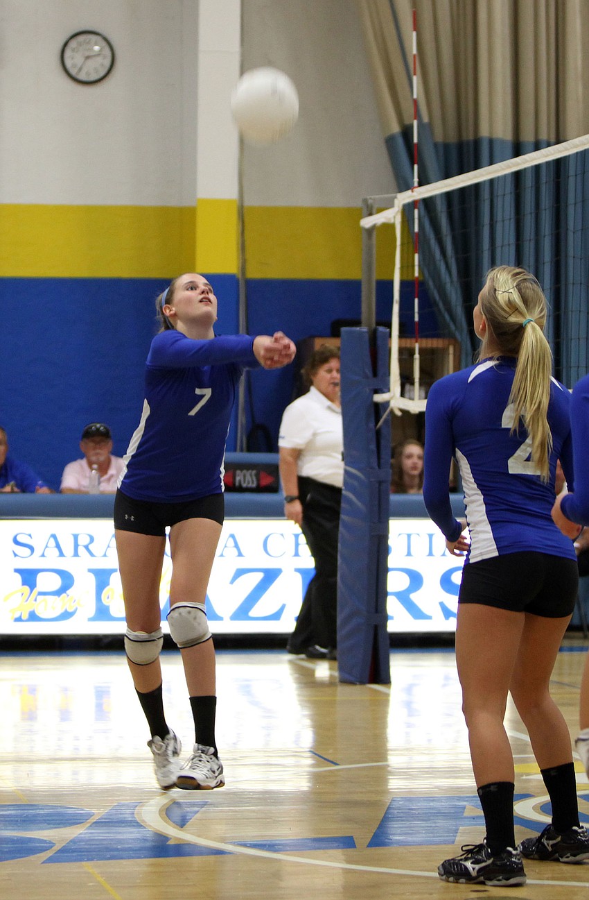 Chyenne Miller, No. 7, bumps the ball.