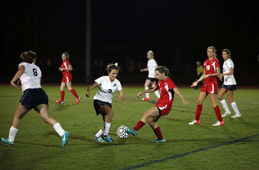 Cardinal Mooneyâ€™s Anna Brusco, No. 1, tries to get the ball past ODAâ€™s Elena Ciaccio, No. 3.