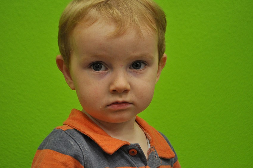 Henry Schiller, 19 months, likes the puppet show best.