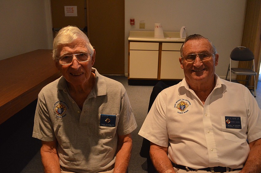 George Tuoti and Guard Leo Seng