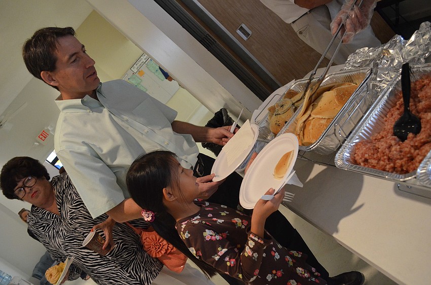 Roger Weber gets breakfast with Marie Weber.