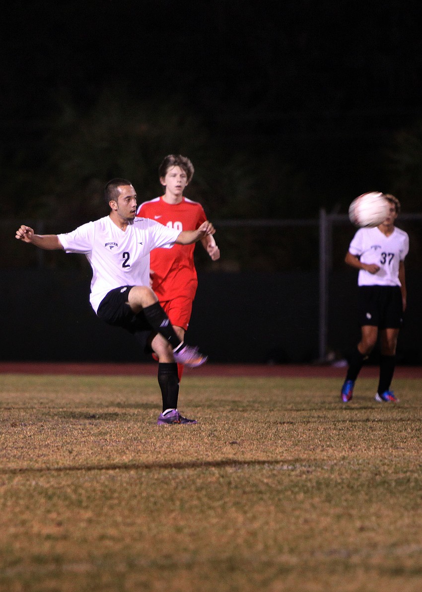 Bookerâ€™s Jose Cano, No. 2, kicks the ball.