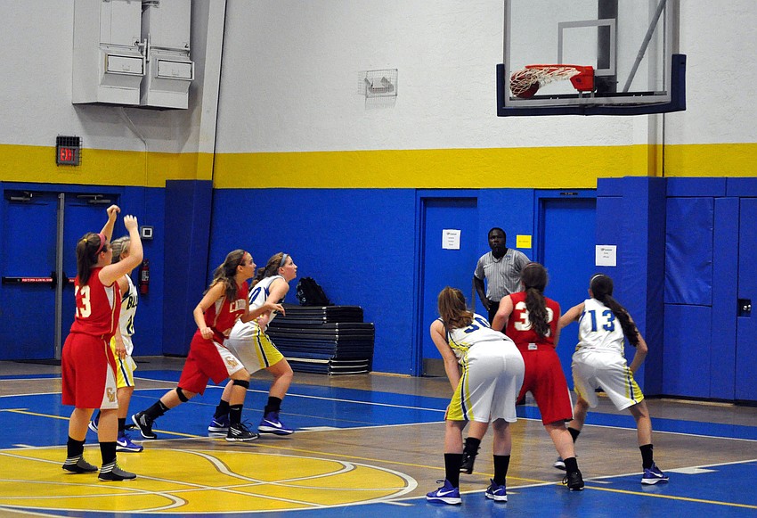 Cardinal Mooneyâ€™s Quinn Incardona, No. 13, shoots and scores during her free throw.