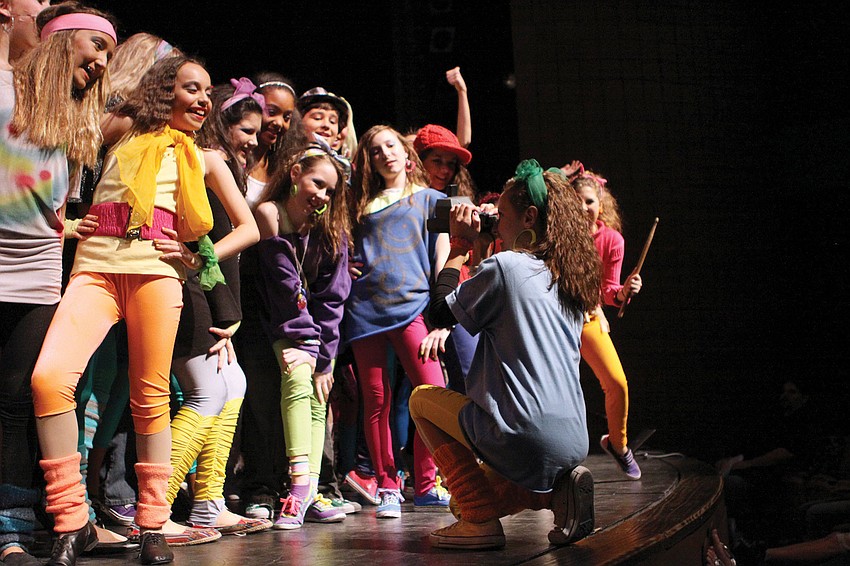 Taylor DeStasio, right, took a Polaroid of the class at Performing Arts school during Sarasota School of the Artsâ€™ performance of â€œFame Jr.â€ at Booker High School.