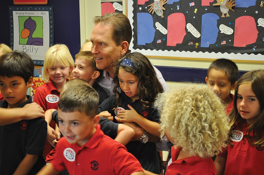 Congressman Vern Buchanan talked about the importance of voting and asked students to reveal their interests before the mock debate began.