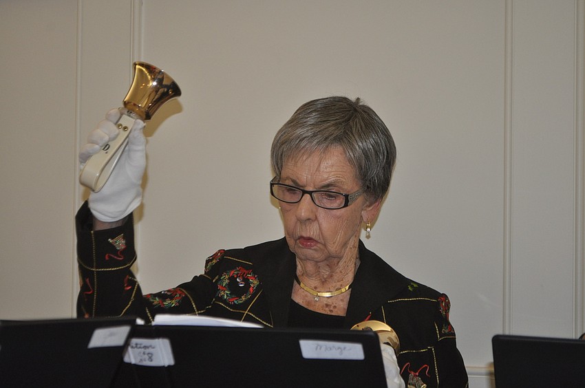 Marge Stapleton rings a bell in the carol, 