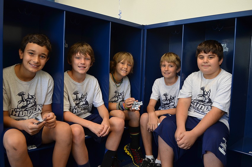 Grant Nassey, Tyler Oâ€™Donoghua, Phineas Scanlan, Nathan Radovich and Mallick Sholi check out the new lockers at the boys changing station.