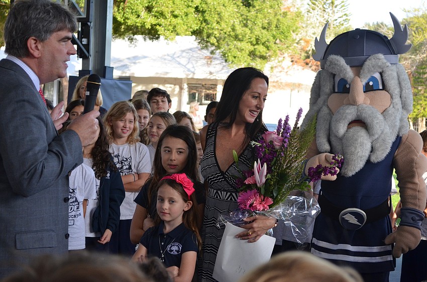 Students surround Ashley Kozel to sing her Happy Birthday on Friday, Jan 11.