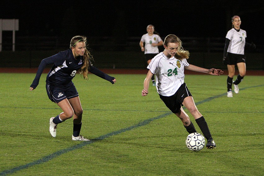 ODAâ€™s Alyssa Mason, No. 8, tries to block Shorecrest's Olivia Rovin, No. 24, from passing the ball.