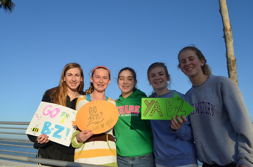 Faith Fietsam, Natalie Allen, Maggie Myles, Maggie Stoll and Claire Torkelson cheered on the runners.