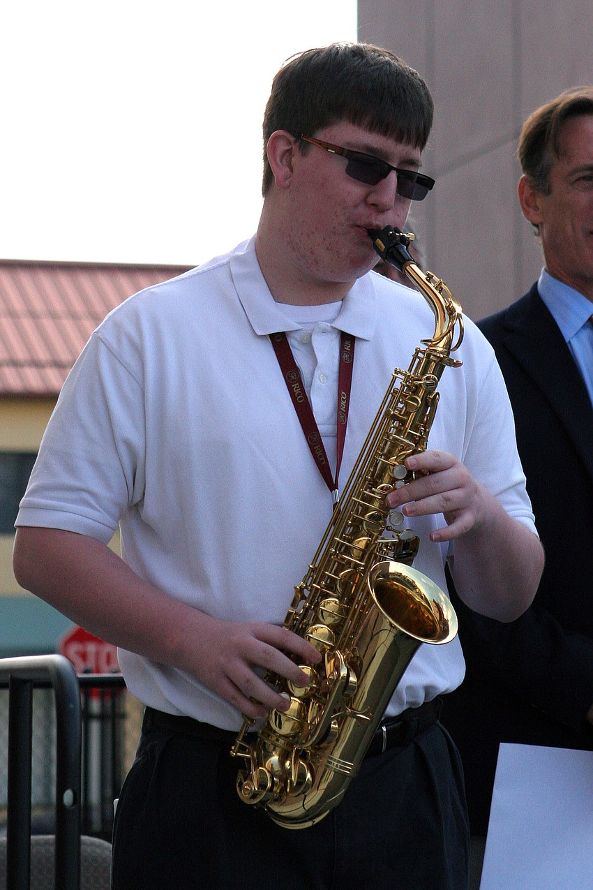 Austin Crick performed the National Anthem on the saxophone.