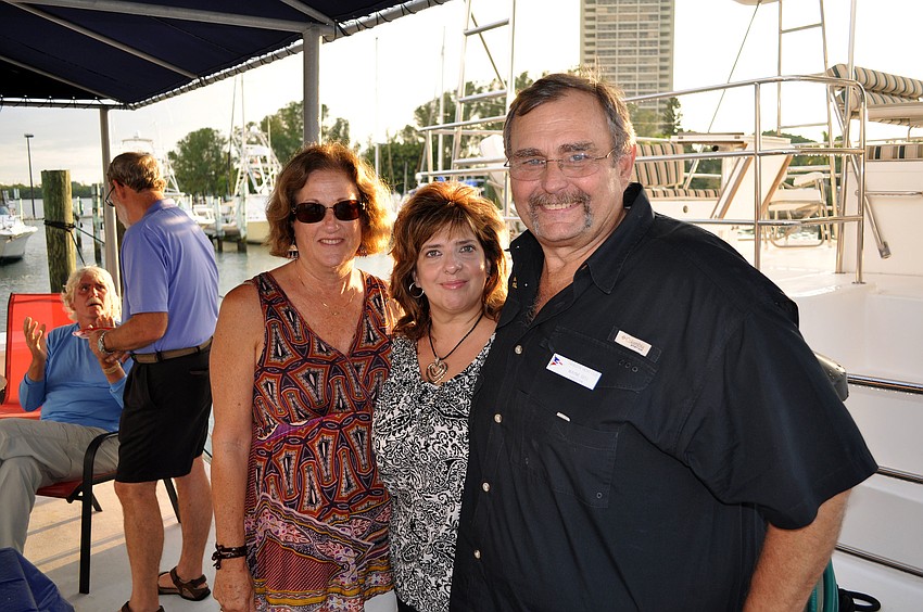 Karen McClure poses with Julie and Wayne Seel