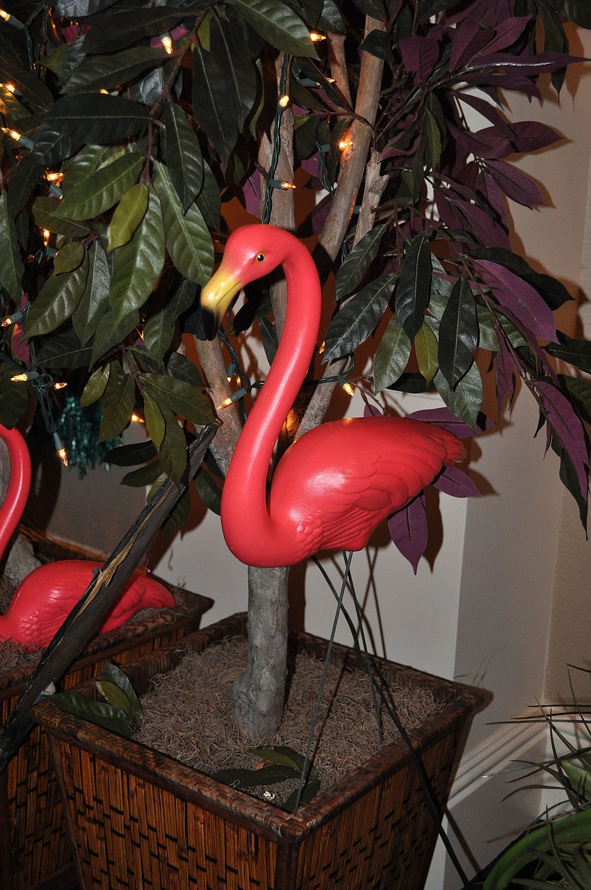 There were many grass skirts, leis and pink flamingos that decorated the inside of the club.