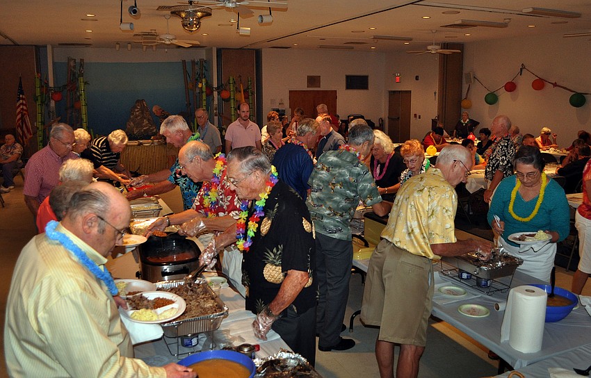 More than 140 people participated in the third annual Knights of Columbus Annual Luau at St. Michael the Archangel.