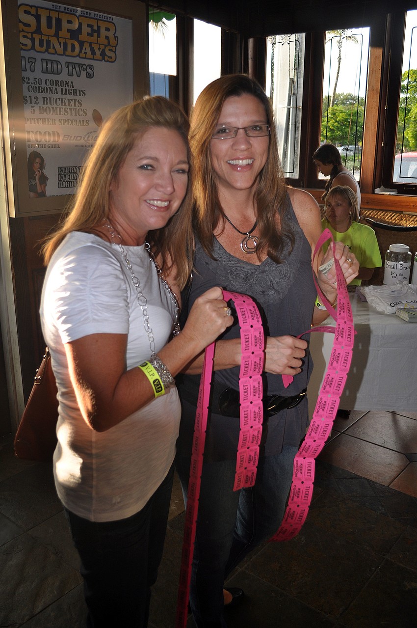 Kathy Fleeman and Courtney Perkins with their raffle tickets.