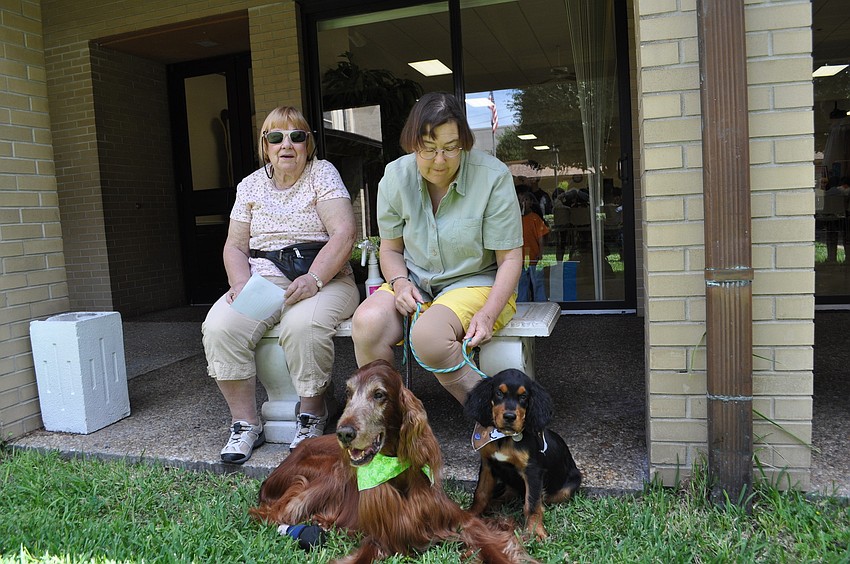 Madeline Kocubek and Dr. Denise Beck-Melis with her dogs, Danny Boy and Joey