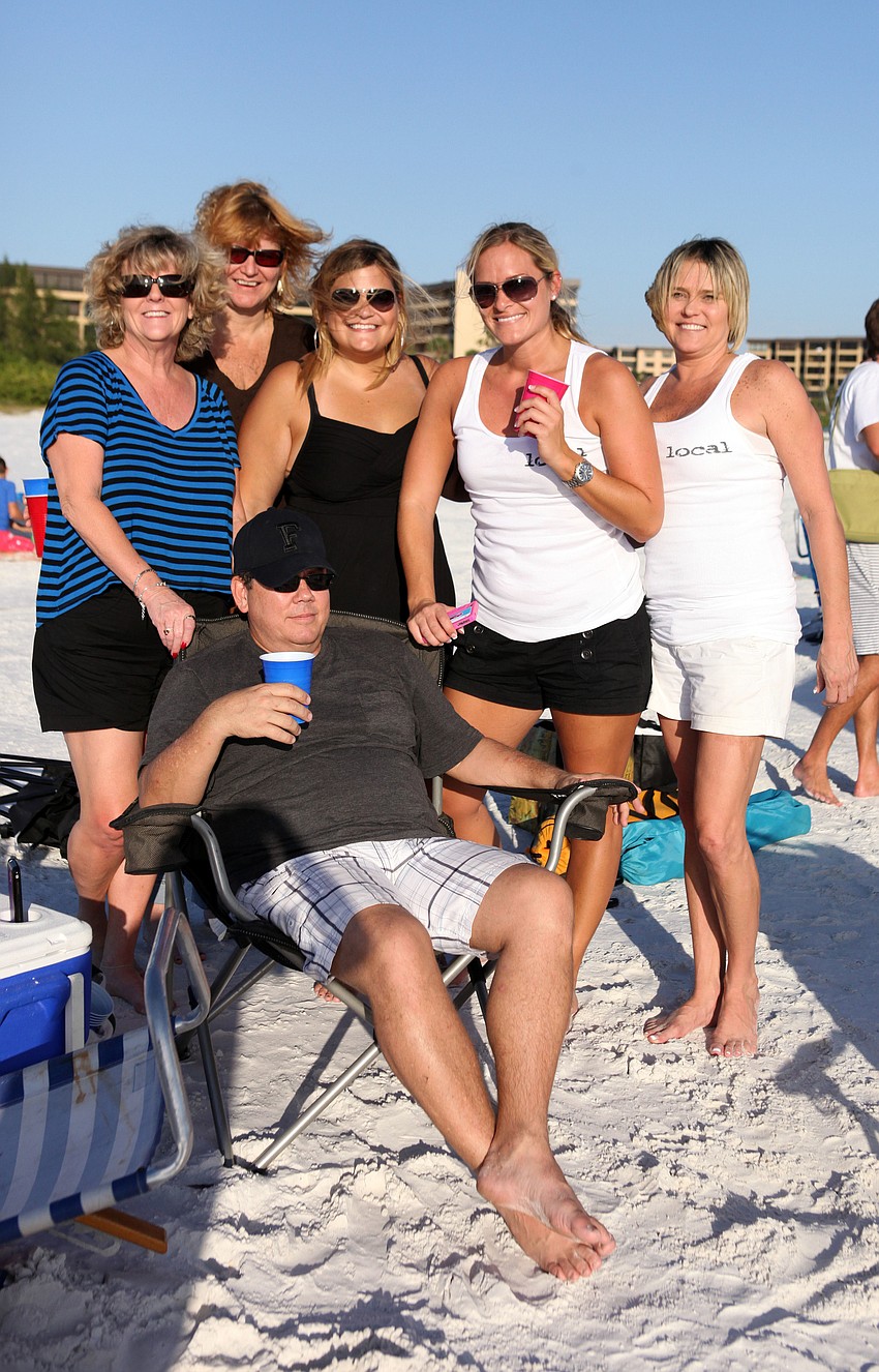 Cara Sullivan, Kate Bishop, Dara Baranski, Katelyn Baranski and Staci Ryan pose behind Tracy Srodes Saturday, Oct. 13.