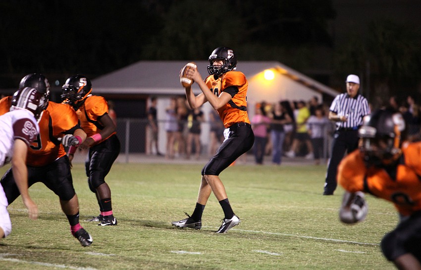Hunter DeWitt, No. 10, prepares to throw the ball.
