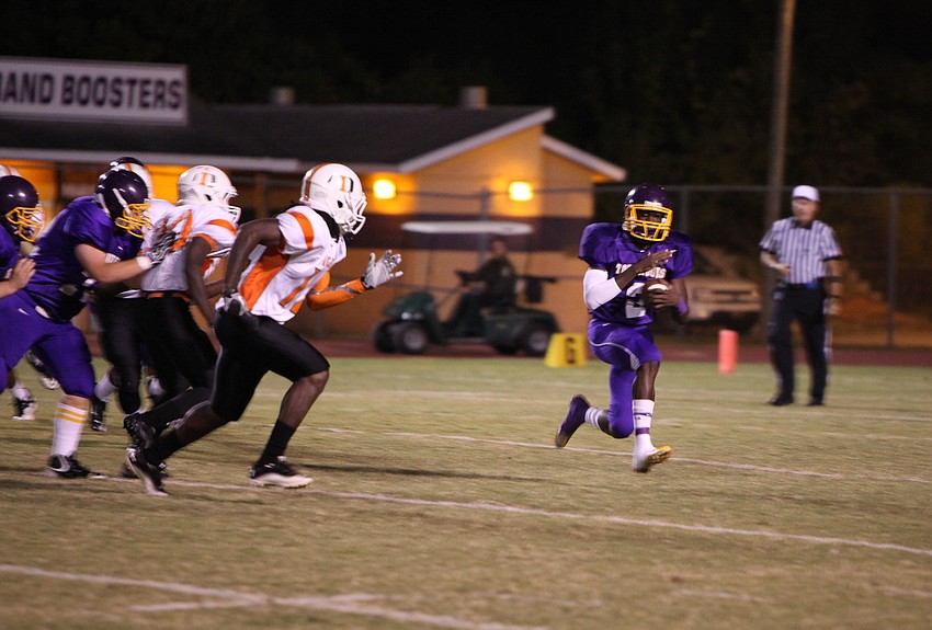 Marlon Mack, No. 2, runs with the ball.