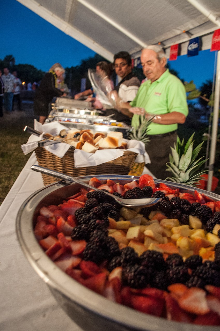 Partygoers enjoyed a catered dinner.