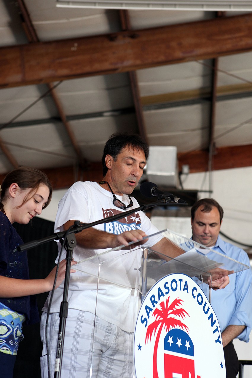 Ed Brodsky led the crowd in a prayer