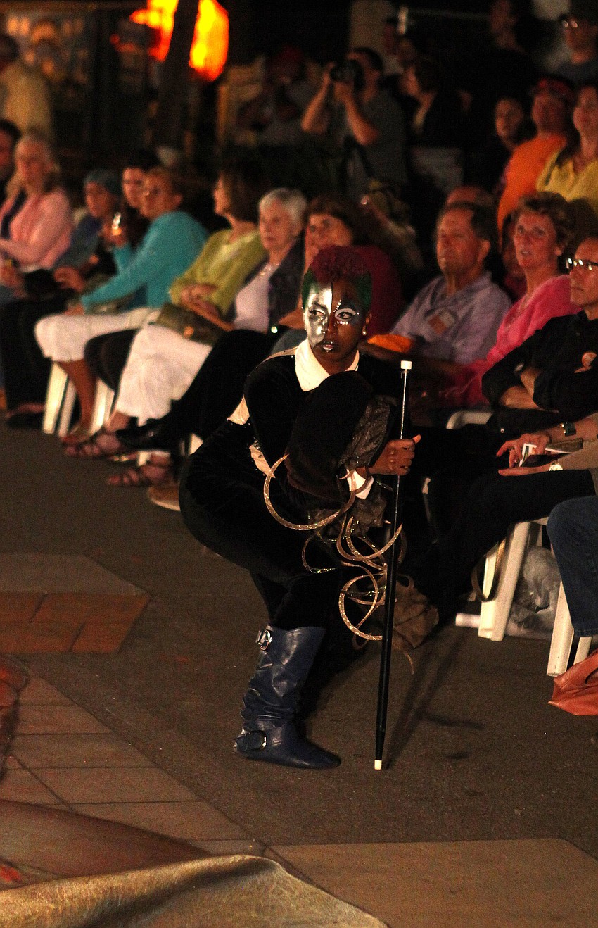 Dhakeria Cunningham played the ringmaster in Fuzion Danceâ€™s production â€œ3-DANCEâ€ Monday, Nov. 5, on Kurt Wennerâ€™s chalk piece.