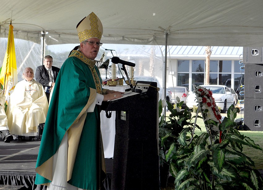 Reverend Frank J. Dewane delivers mass.