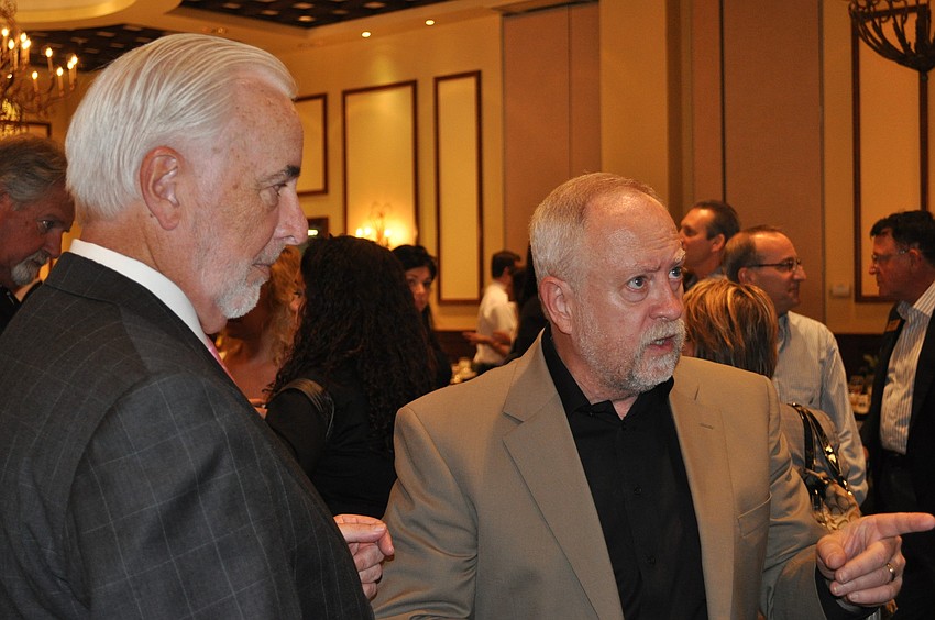 Rex Jensen and Ed Hunzeker met with their audience after they spoke.