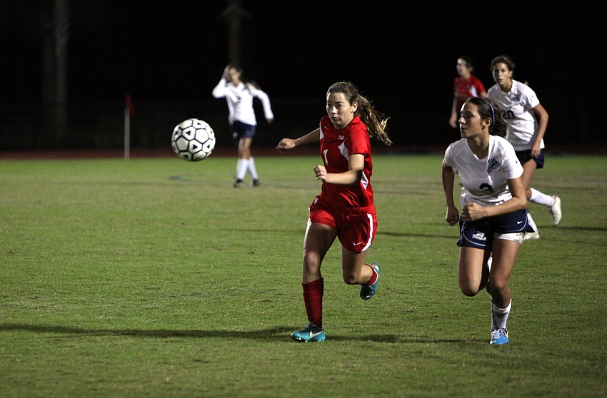 Cardinal Mooneyâ€™s Anna Brusco, No. 1, and ODAâ€™s Elena Ciaccio, No. 3, both go after the ball.