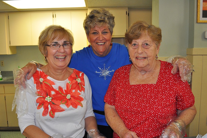 Ann Fifolt, Helen Leavitt and Beverly Collins served homemade coffee cake.