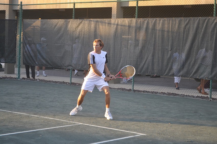 Scott Shields of the Bath & Racquet Club prepares to hit a down-the-line backhand.