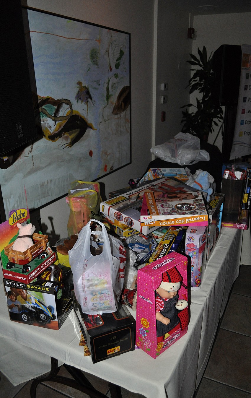 A table was set up at YPG after hours for all of the donated toys to be dropped off for the Big Brothers Big Sisters toy drive Thursday, Dec. 6, at Libbyâ€™s.