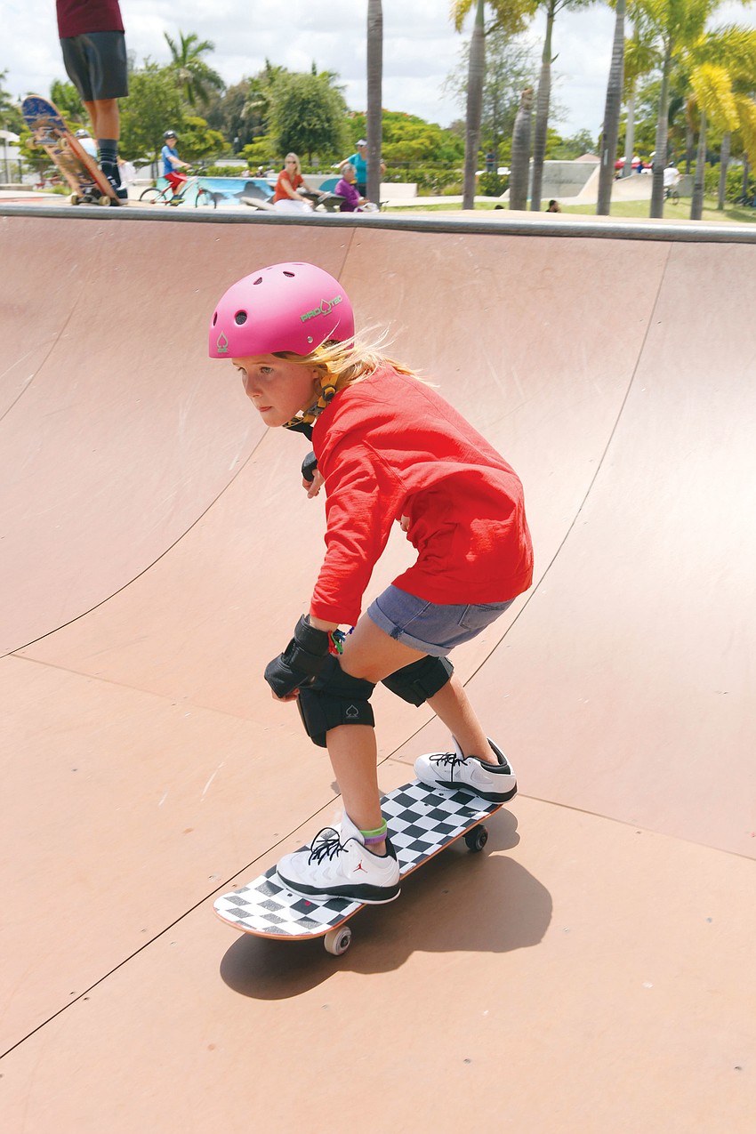 Kaya Eible, 8, has fun on the ramp at the Payne Park skate park.