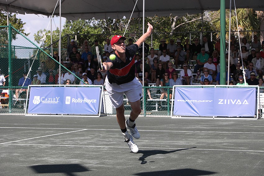 Sam Querrey jumped for a forehand shot during the Sarasota Open Menâ€™s Finals match April 23 at the Longboat Key Club Tennis Gardens. Querrey won the 5th annual tournament.