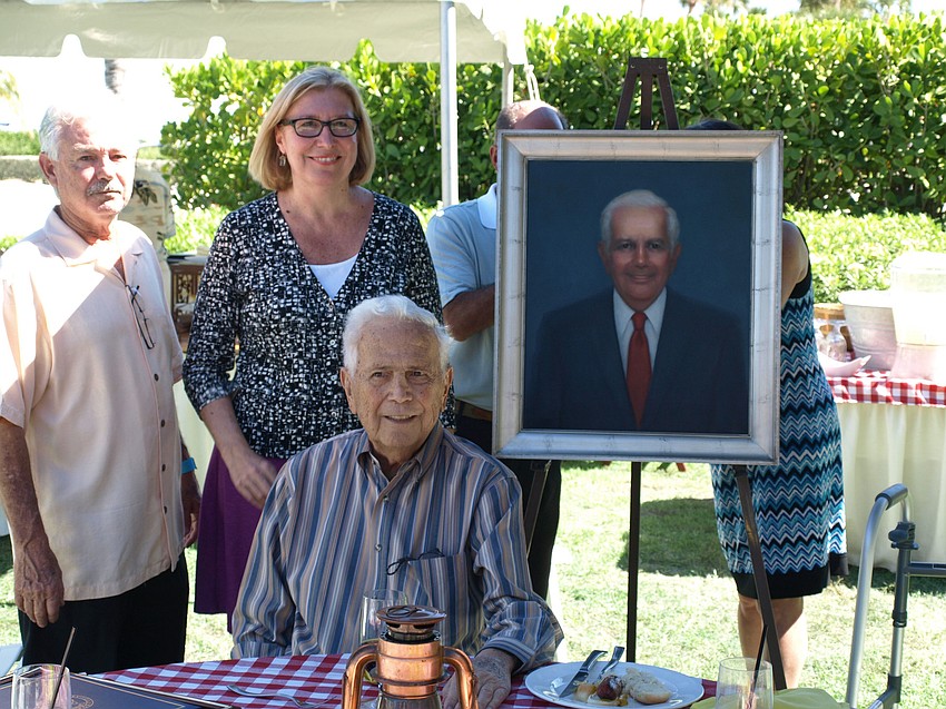Mayor Jim Brown presented Hal Lenobel with a portrait Oct. 21 during Hal and Hazel Lenobel Appreciation Day. More than 80 people attended the picnic at Longboat Key Club Harbourside to honor the former mayor and his late wife.