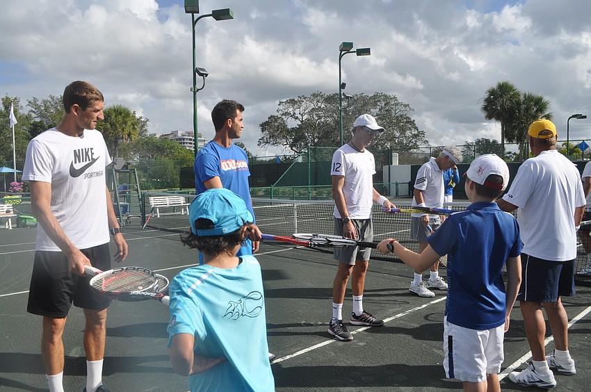 Longboat players paired up with professionals for an icebreaker drill.