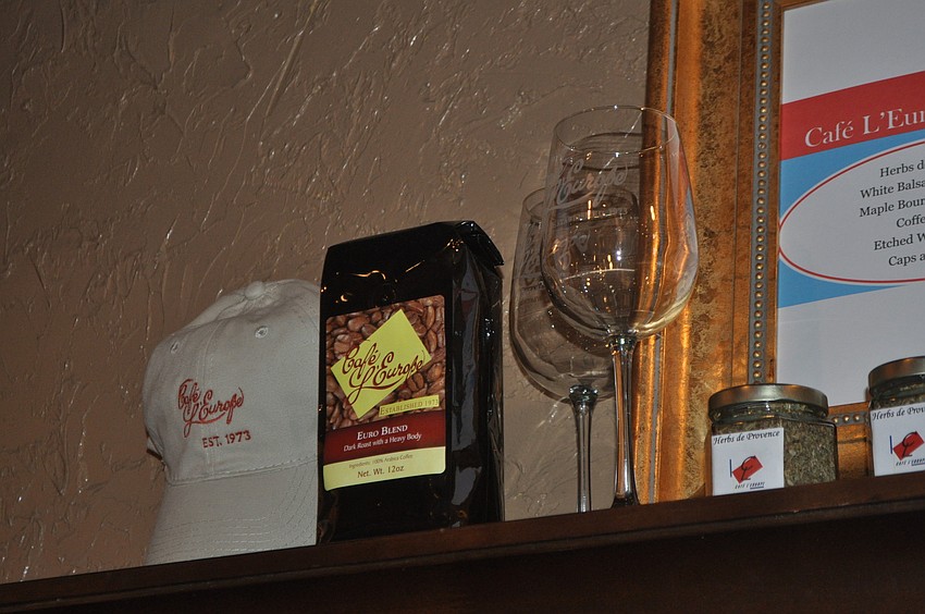 CafÃ© Lâ€™Europe is selling logoed merchandise to commemorate the anniversary.