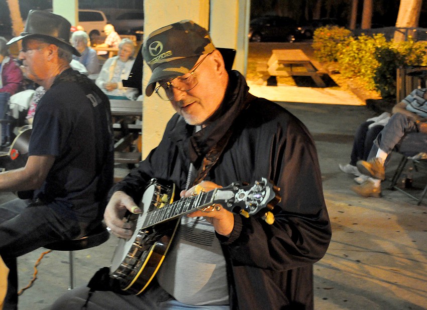 Keith Stephen plays the banjo.