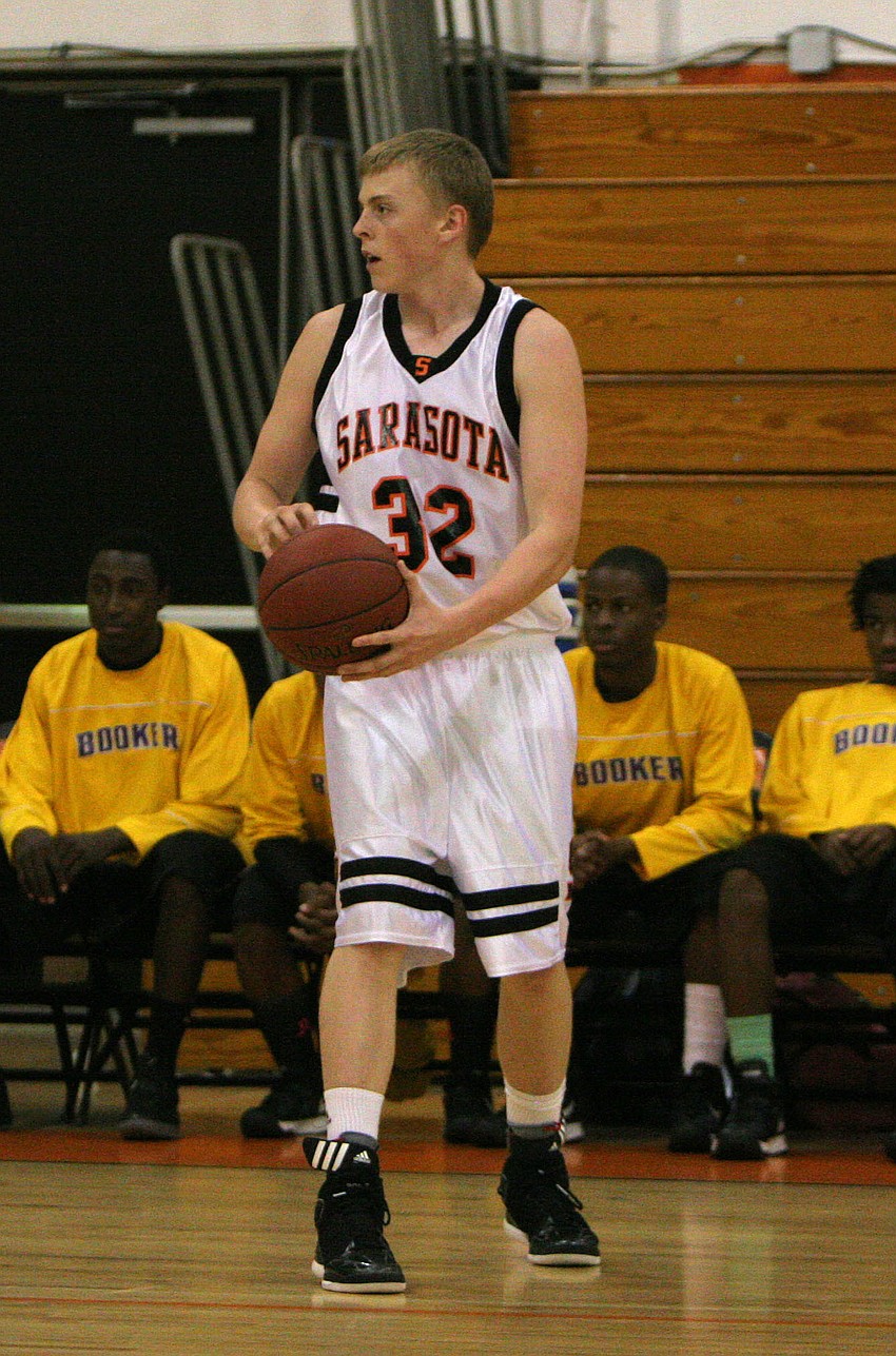 Sarasota High Schoolâ€™s Zach Rowden looks to pass the ball.